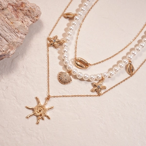 Three-layer gold necklace set with pearls, starfish and shell pendants for women