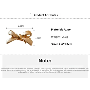 Detailed specs of mini golden bow hair clip made of alloy weighing 2.5g and 2.6cm long