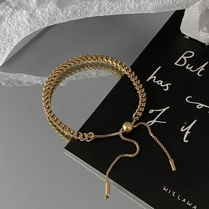 Adjustable rose gold woven titanium steel bracelet with slider closure for women