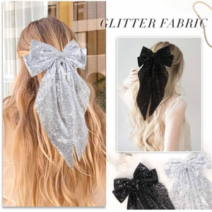 Sparkling oversized glitter fabric bow hair clip with ribbons for women in silver and black