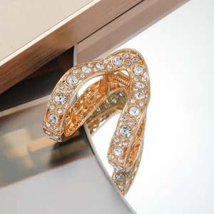 Elegant gold metal V-shaped hair claw clip with rhinestones for high ponytail styles