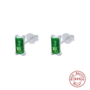 Macro detail of square emerald green cubic zirconia studs in 925 sterling silver