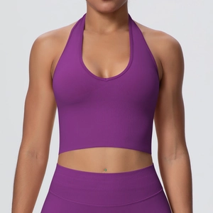 Detail of high-stretch purple ribbed knit halter crop top with deep V-neck for yoga