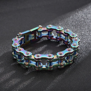 Macro shot of iridescent rainbow bicycle chain bracelet with industrial link details