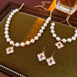 Luxury gold plated four-leaf clover flower jewelry set with pearls and rubies