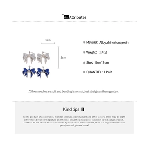 Detailed spec sheet of silver and blue rhinestone bow earrings with 5x5cm dimensions