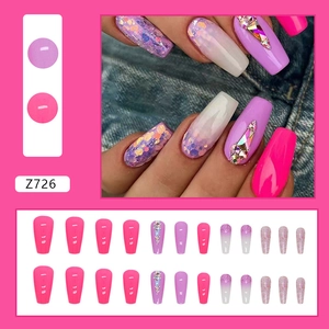 Sparkly ballet-shaped long coffin press-on nails with purple glitter and rhinestones
