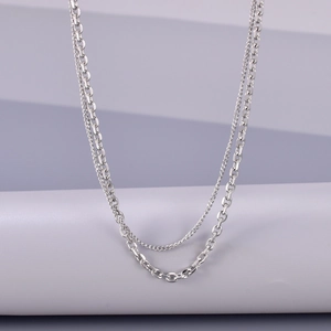 Minimalist double-layered silver stainless steel necklace with curb and cable chain design