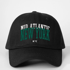 Detailed front view of black cotton baseball cap featuring green NYC embroidery