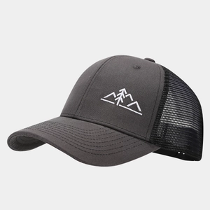 Detail of mountain embroidery on dark grey mesh trucker cap for outdoor activities