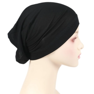 Close-up of black modal hijab cap with breathable elastic fabric on a head model
