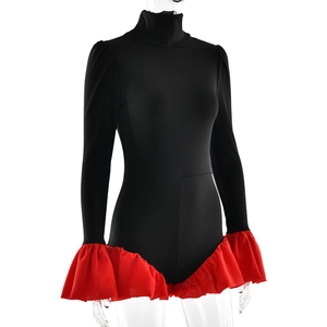 Detail of black turtleneck bodysuit featuring stylish red flared cuffs and hem on a mannequin