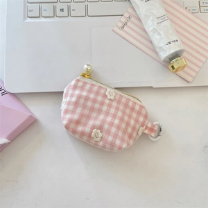 Detail of pink plaid coin purse with flower embroidery and pearl zipper charm