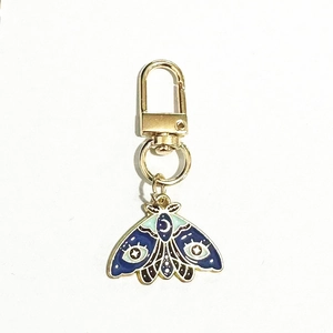 Creative zinc alloy butterfly moth keychain with blue enamel moon and eye charm