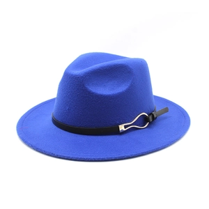Detail of royal blue wool fedora hat with black leather band and gold metal buckle