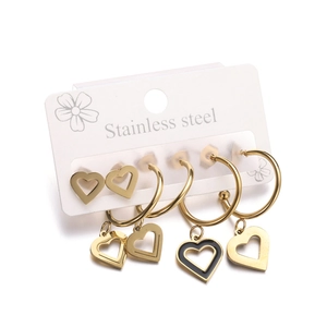 French vintage style gold heart earrings set in stainless steel with black enamel detail