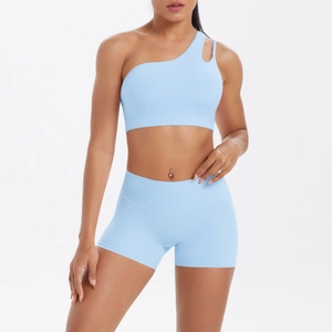 Light blue one-shoulder sports bra and high-waist yoga shorts seamless fitness set