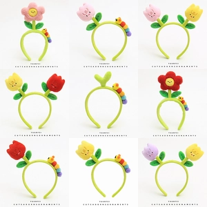 Cute plush headband collection featuring colorful tulip and caterpillar designs on white background