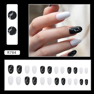 Matte marble press-on nails set with elegant black and white oval false nail tips