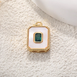 Rectangle gold-plated white shell pendant with green gemstone and beaded edges