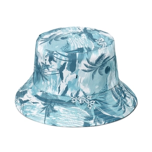 Tropical coconut tree print bucket hat in light blue and white for outdoor sun protection