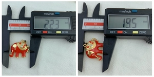Detailed measurement of red elephant pendant with rhinestones showing 22.3mm width
