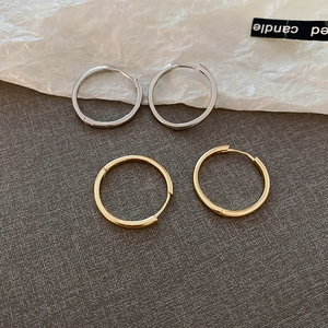 Minimalist geometric hoop earrings set in polished gold and silver finish for women