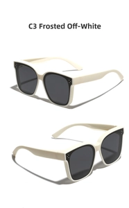 Detail view of matte beige square polarized sunglasses with decorative metal rivets