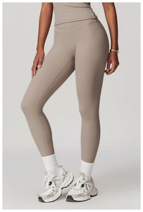 Detail of high waisted compression yoga pants with wide waistband for tummy control