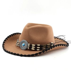 Classic brown felt cowboy hat with ethnic beaded band and turquoise silver ornament