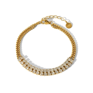 Close-up of dual-layer golden stainless steel chain bracelet with radiant zircon stones
