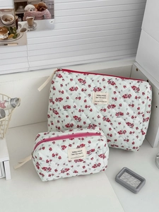 Quilted floral corduroy makeup bag set with green fabric and red flower pattern