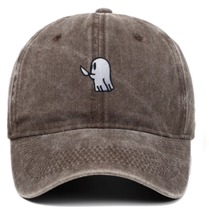 Detailed view of white ghost embroidery on dark brown washed cotton baseball cap
