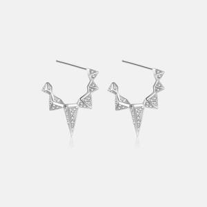 Macro view of 925 sterling silver triangle hoop earrings with pave zircon detail