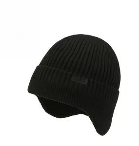 Detail of black ribbed knit beanie with sport tag and fleece lining for ear protection