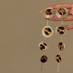 Exaggerated leopard print round fringe earrings with layered golden circles and tassels
