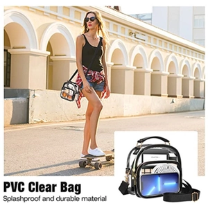 Detailed view of clear PVC crossbody bag with black trim showing spacious capacity