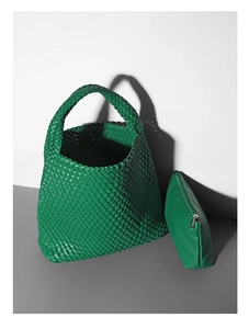 Detail of green woven bucket bag set including a large tote and matching zipper pouch