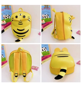 Detail view showing four angles of a yellow tiger cartoon toddler backpack with 3D ears