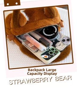 Detailed view of the strawberry bear plush bag interior showing large storage capacity