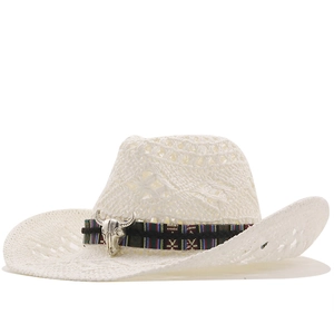 White woven straw cowboy hat with ventilated crown and silver bull skull accessory