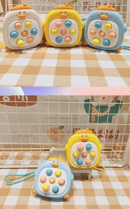 Detail of cute duck and penguin fidget toys with colorful silicone buttons and lanyards