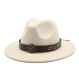 Detailed view of beige fedora with brown faux leather band and metallic floral stud