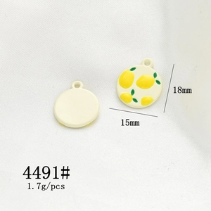 Macro view of 18mm enamel lemon charm with dimensions 15mm and weight 1.7g specifications