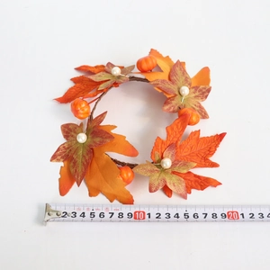 Detail view of 15cm autumn candle ring with maple leaves, pumpkin and white pearls