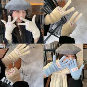 Chic candy-colored knit gloves with touch screen tips in beige and light blue tones