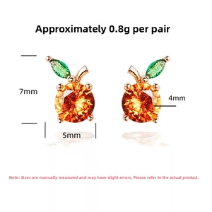 Detail view of S925 silver grapefruit stud earrings with dimensions 7mm by 5mm