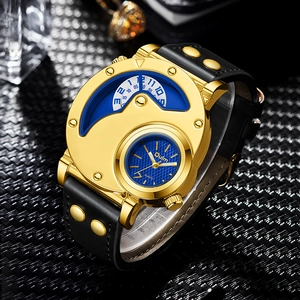 Detailed macro shot of a gold dual-dial quartz watch with blue face and black leather strap