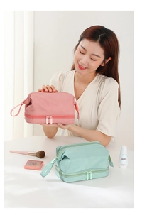 Pink and mint green double-layer cosmetic bags with portable handles and waterproof fabric