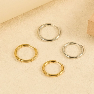 Minimalist high-polished stainless steel hoop earrings in gold and silver finishes